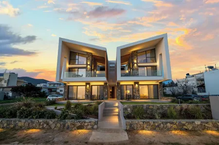 Evelmare Beachfront Apartments Отели в г. Makris Gialos