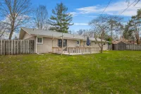 Charming Backyard Oasis with Fire Pit and Rec Room - Inviting Getaway