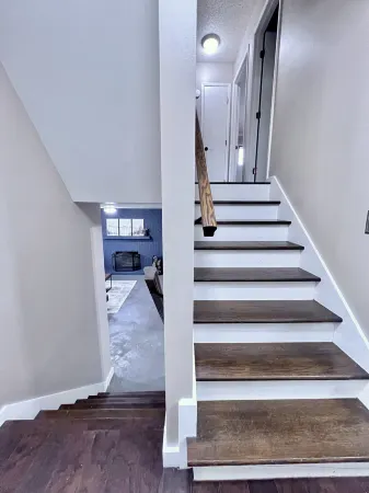 Modern Amenities and Cozy Fire Pit - Charming Split-Level Escape