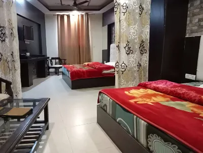 Green Palms Rubystone Exotic Hotels near Santoshi Mata Temple