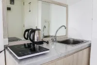 Minimalist Studio Apartment at Poris 88 with City View