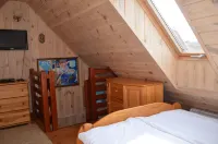 Dworek Mazurski Lizer فنادق في Wegorzewo County