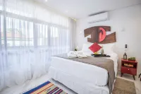 Loft moderno com AC na Praça Pôr do Sol Hotéis em Alto de Pinheiros