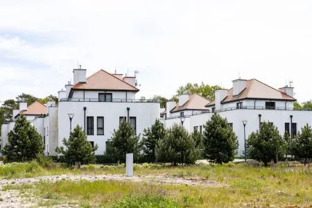 Escada Luksusowy Apartament Z Kominkiem i Tarasem Отели в г. Rogowo