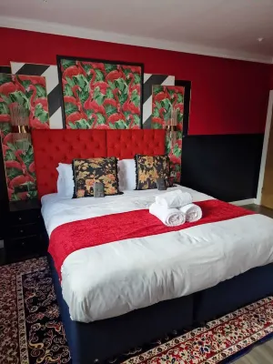 The MAD Hatter's Guestrooms