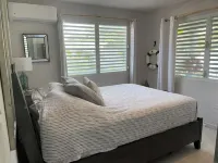 Malecon Beach House with beautiful backyard. Steps from the Caribbean ocean.
