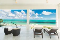 Villa DelEvan 4E / Beachfront 6 bedroom house on the Grace Bay Beach,