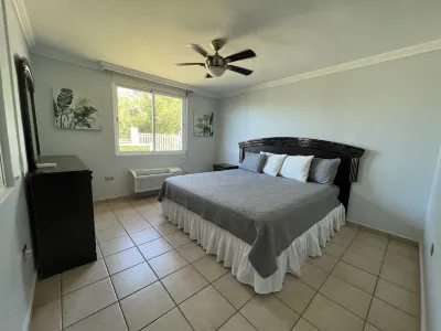 Garden condo, pool, close to beach and Rio Mar Hotel gulf course.