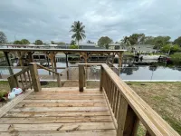 Waterfront, indoor pool, covered marina, fenced 3/2 home