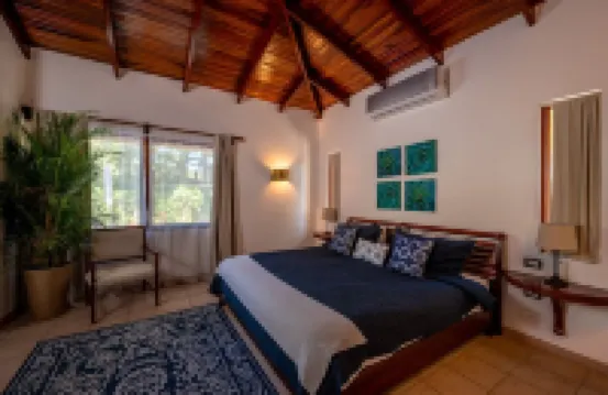 Spacious 3-Bedroom Villa. with a pool, rancho- STEPS away from Langosta Beach.