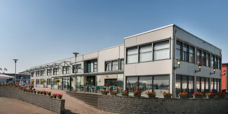 Hotel de Boegschroef Отели в г. Схемда