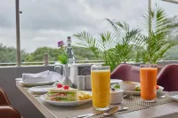 Grand Continent Mysore A Sarovar Portico Affiliate Hotel - breakfast