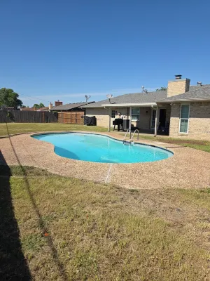 3-bedroom home in Lawton near Ft Sill with large yard, pool and Chefs kitchen - 4-Star