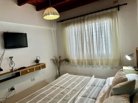 Charming 1-bedroom apart. with WiFi, AC, garage propio in welcoming Godoy Cruz Отели рядом с достопримечательностью «CEBJA 3-033 Miguel Lillo»