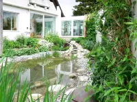 Comfortable apartment in the middle of a beautiful garden