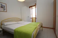 Enjoy our villa with private garden in Rosolina