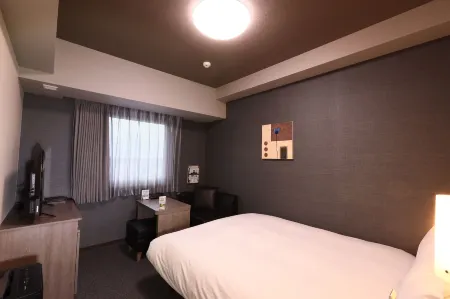 Hotel Route Inn Shimotsuma Отели в г. Симоцума