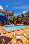 2-bedroom Gated Oasis with parking andPool - 3-Star