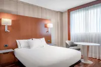 AC Hotel Huelva Hôtels à proximité de : Peluquería Charo Losada