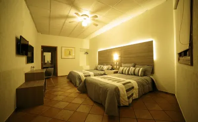 Hotel la Mansion Suiza Hotels near Autopartes El Gallo