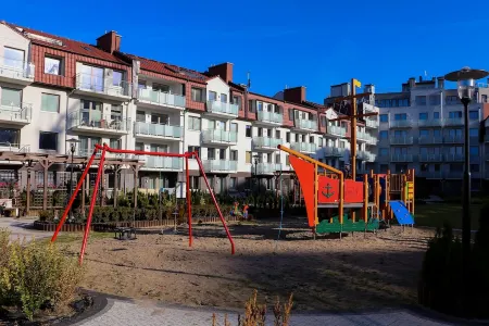 Apartamenty Świnoujście - Kwartał Róży Wiatrów II Отели рядом с достопримечательностью «Свиноуйсьценский маяк»