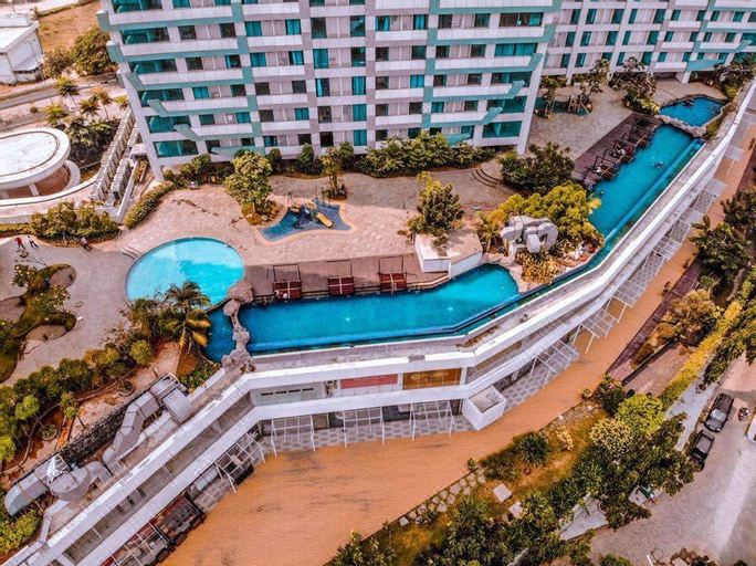Studio Room with Netflix at Apartemen Grand Kamala Lagoon by Apartemenku