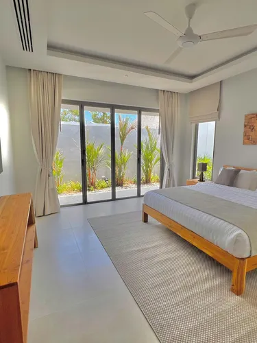 รูปภาพของLuxury brand new villa with maid Anchan Tropicana