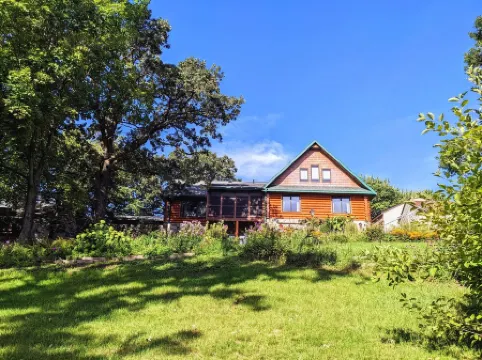 Log Home w/Hot Tub on Fountain Lake. with 300 Miles of Snowmobile Trails Nearby!