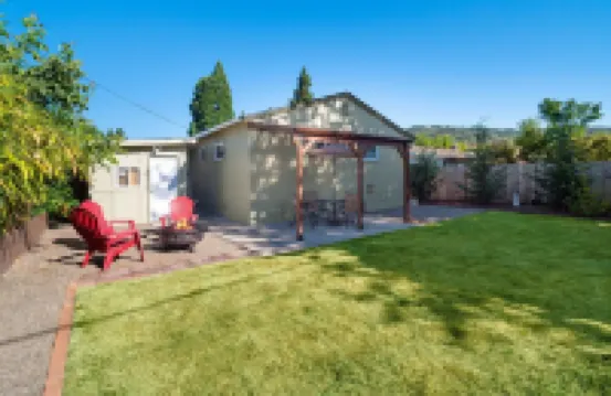 Modern Mid-Century Retreat with Stylish Amenities & Family-Friendly Comfort