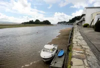 Modern home with spectacular sea / estuary and mountain views