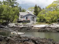 Enjoy the stunning views while relaxing on the deck at East Ledge Cottage