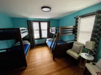 Enjoy Beautiful Sunsets at this Lake House w a HOT TUB, Boat Garage and Game Rm