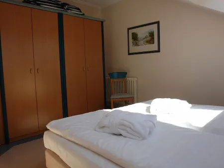 Modern, quiet apartment close to the beach on the outskirts of Binz with balcony Отели в г. Бинц