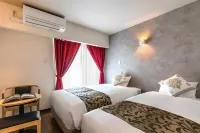 Mr.Kinjo Inn Rycom Kitanakagusuku Hotel a 