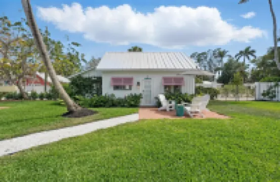 The Historic Coquina Cottages C is 2 Blocks to the Beach, 5th Avenue and 3rd St.