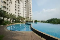 Cozy and Comfortable Studio (No Kitchen) Apartment at Mustika Golf Residence - Parkplatz
