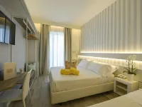 Hotel Aristeo Hotels near 105 Stadium