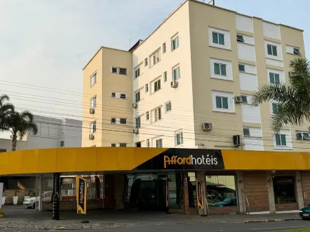 Afford Hotéis Отели рядом с достопримечательностью «Escola Municipal Lupércio de Oliveira Köeche»