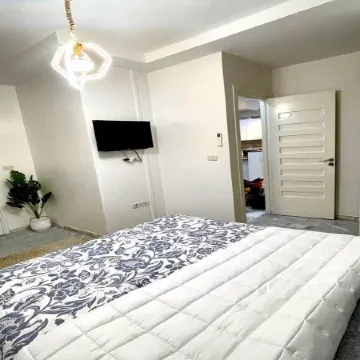 Cozy 1BR Retreat, Steps to Sand