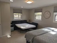 Hot Tub and Game room! Center of Town