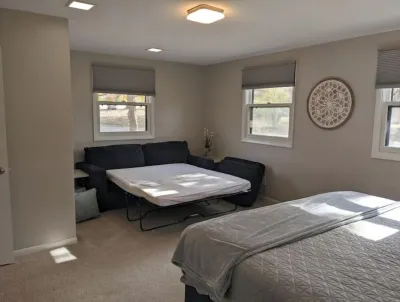 Hot Tub and Game room! Center of Town