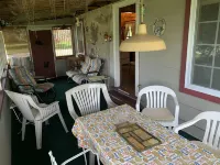 Torch Lake Village Cozy Cottage with private dock