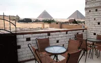 Beautiful view of the Pyramids, with air conditioning, WiFi, and touristic guide