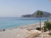 Apartment in front of the beach and with free parking in the same building.