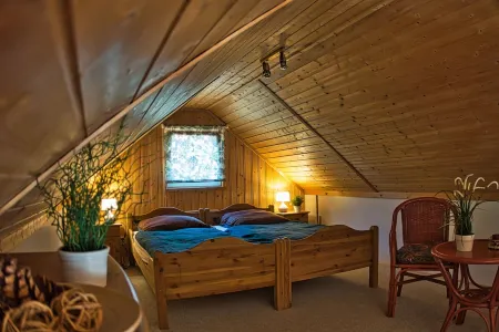 Holiday house with 3 bedrooms directly on the Useriner See with bathing beach, fireplace