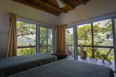 Jungle, waterfall, sea view, 5 minutes from beach, lap pool & gym. Bird watching