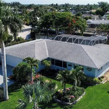 Canalfront Retreat! 2BR + Bunk Nook, Pool & Boat Dock – Easy Water Access!