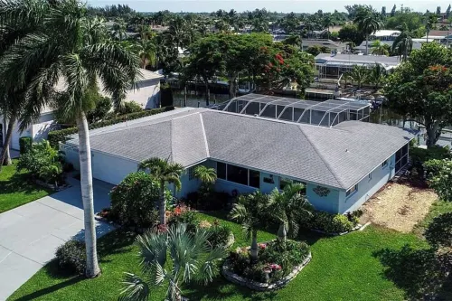 Canalfront Retreat! 2BR + Bunk Nook, Pool & Boat Dock – Easy Water Access!