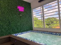 Charming Getaway in the Heart of Baní – Private Jacuzzi Included! Hotel a 