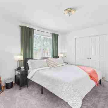 Bright, Single-level 2BR/2BA Townhome with Open Living Spaces and Relaxing Patio Rooms